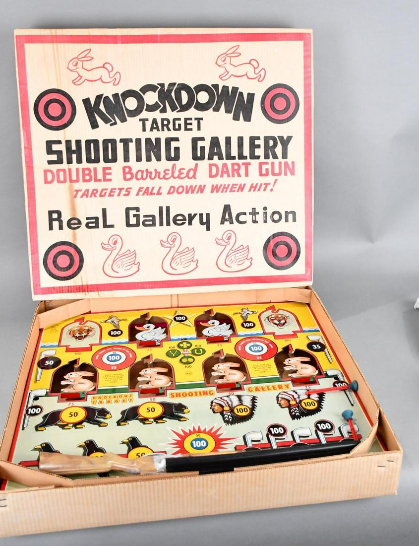 Marx "Knockdown Target Shooting Gallery NIB: rated 9.5, 26"x28", the SST target game is in excellent condition, has gun and darts.