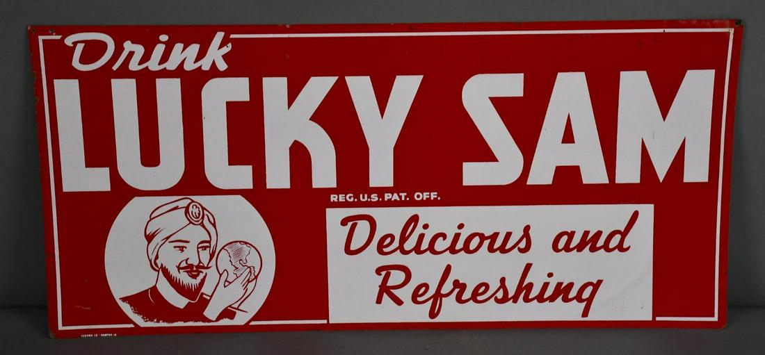 Drink Lucky Sam w/Logo Metal Sign: rated 8.9, 14"x30", SST sign has good color and shine, light wear, marked Vernon Co., Newton, Ia.