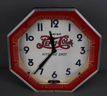 Drink Pepsi:Cola "Hits the Spot" Octagon Neon Clock: rated 9, 18"x18"x8", the clock is in very good condition, lights up and clock works.