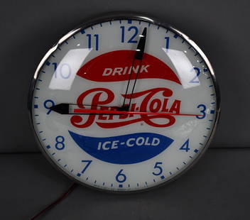 Drink Pepsi-Cola Ice-Cold Lighted Pam Clock: rated 9, 15"D, the glass face is in good condition, metal body has light wear with an original Warning Decal. lights up and works.