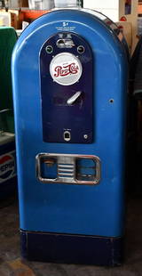 Jacobs Model #56 Pepsi-Cola Lighted Coin-Operated Vending Machine: rated 7.75, 60"T., the paint has good color and shine, has light wear and a few small dents, works, usually the lighted bottle cap has spots and this one does not, hard to find in this nice of conditi