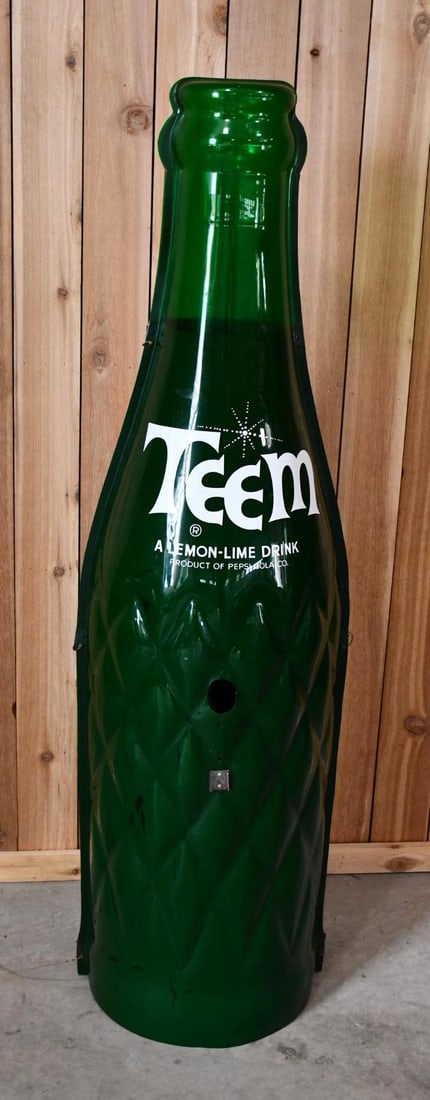 Teem "Light Side of Lemon & Lime Drink Plastic Display Bottle: rated 7.5, 70"T., the plastic bottles has good color, has a crack in the neck on the back sided, has had holes drilled in it.