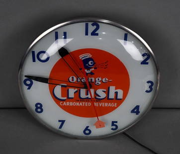 Orange-Crush w/Crushy Telechron Lighted Clock: rated 9, 15"D., clock face is in excellent condition, body has both back doors and original decal is mostly there, works.
