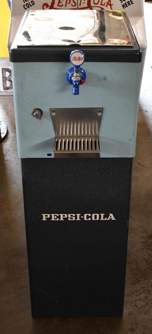 Quikold Ice Chest Soda Dispenser on Stand: rated 8.5, 48"x17"x28", the metal dispenser has good color and shine, with light wear, has Pepsi decals, is a two piece unit.