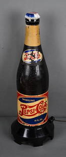 Pepsi:Cola Bottle Shaped Radio: rated 7, 23.5"T., the Bakelite radio has no cracks or chips, does has wear to the water transfer decals and labels, when you turn the radio on it hums.