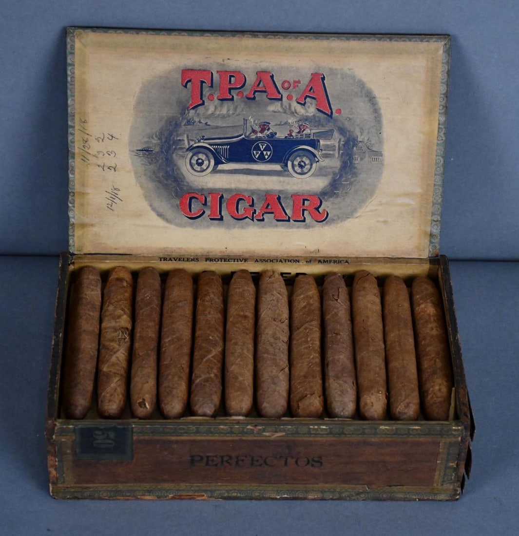 S. Beker's T.P.A. of A. Cigar Box: rated 6, 5.5"x9"x2.5", the box has heavier staining, is full of generic cigars, car on inside.