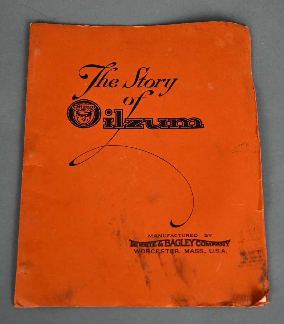 The Story of Oilzum Booklet w/Logo: rated 7.5, 11"x9", the three hole binder has wear to the covers, inside there are 12 three-color pages that tell the story of Oilzum and show alot of they products.