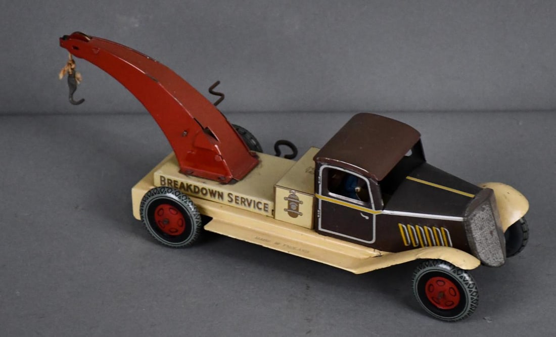 Wells Tin-Litho Windup "Breakdown Service" Wrecket: rated 9.25, 11.5"L., the tin-litho wrecker has good color and shine, has minor wear on fenders and very minor dust staining, motor works, has the Well London mark & is embossed Made in England