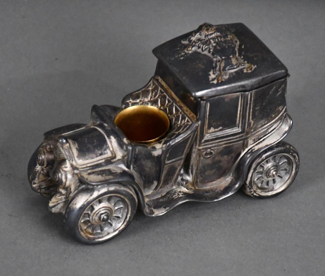Whiting Brothers Matchholder/Cigar Holder Limousine: rated 8, 5.5"T., has wear, has the Whiting Bros., mark on bottom.