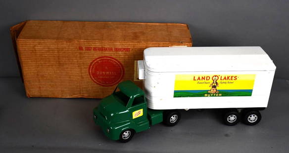 Dunwell Lake o' Lakes Refrigerator Transport Truck & Trailer NIB: rated 9, 22.5&#34;L., the press steel truck and trailer has very good color and shine, very minor wear, except to hitch area has the usual scratches, is missing it&#39;s grill, box is in good conditio