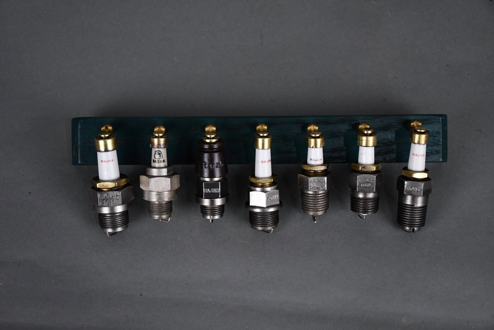 7-Different Rajah Spark Plugs Mounted: all in good condition, Bob mounted them.