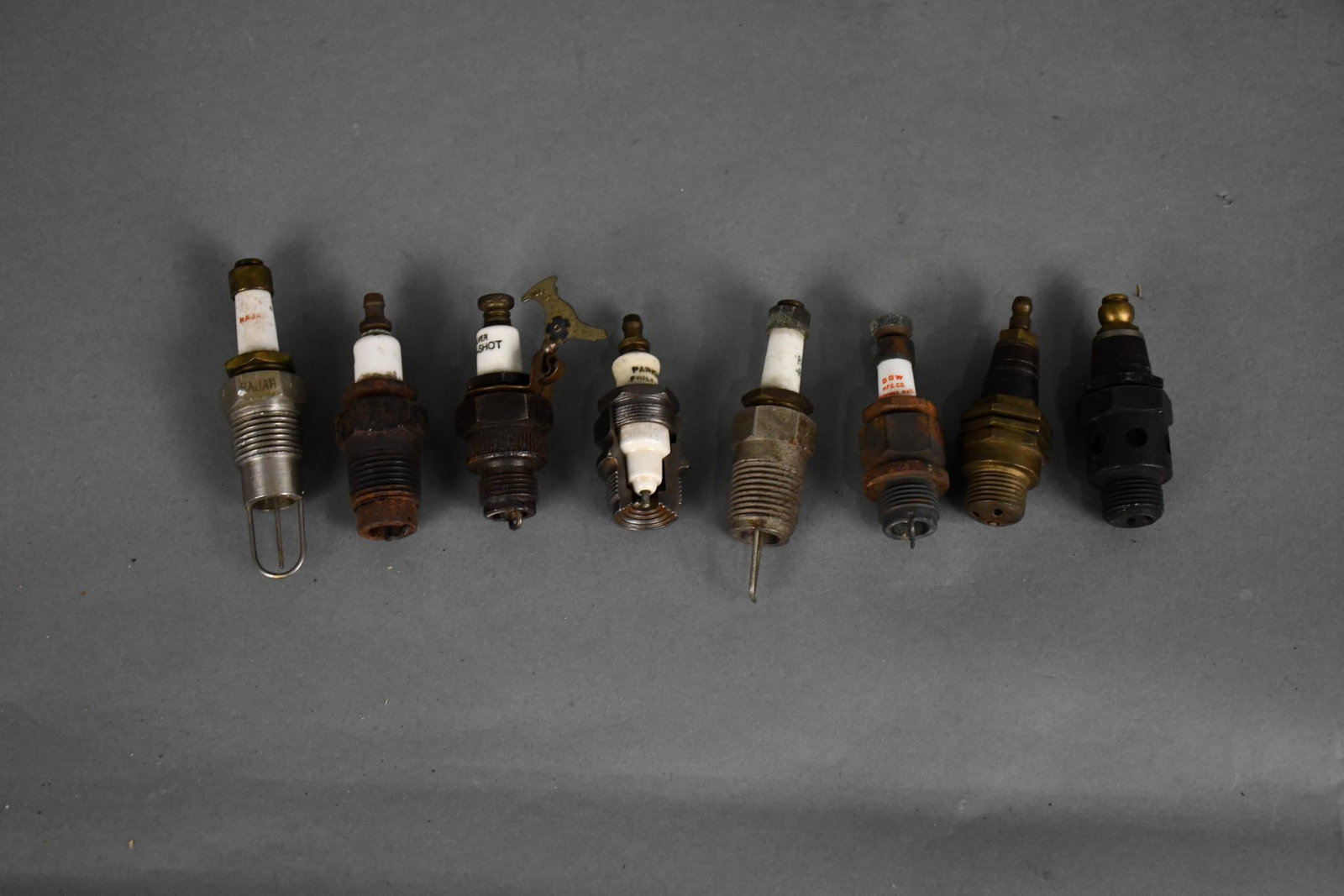 7-Spark Plugs, 1-Cut-a-Way: all different condition, Gun Shot, 2-Rajah, Dow, Shuchit & Others