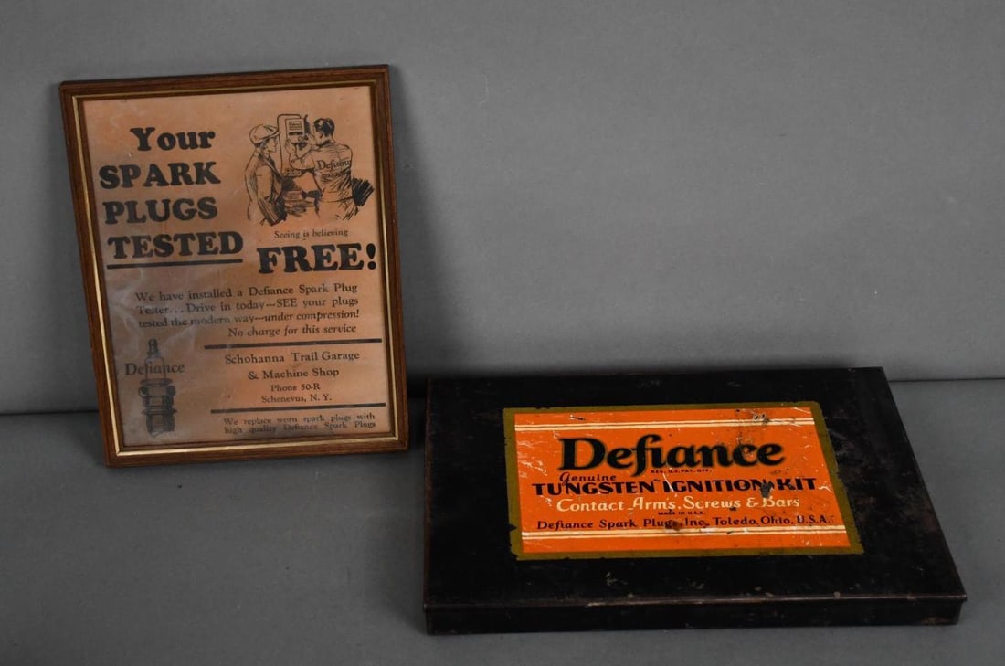 Defiance Genuine Tungsten Ignition Kit Metal Box & Ad: rated 7.5, 9"x13", has wear and fine scratches, no product. the framed ad is stained.