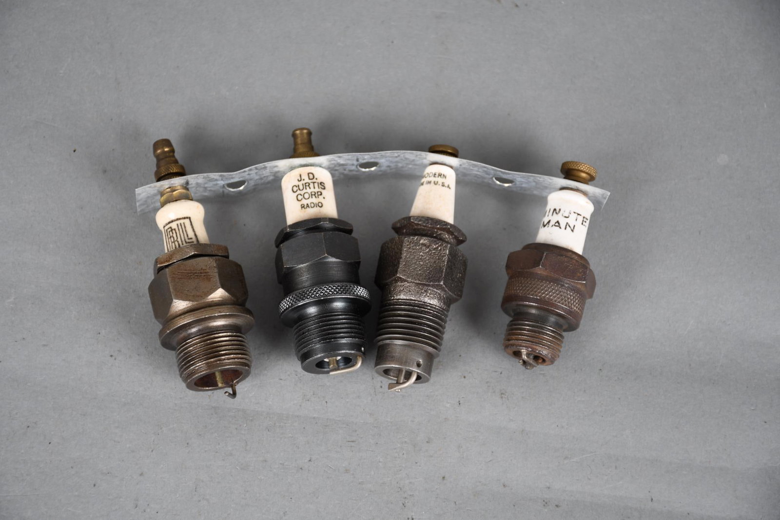 4-Spark Plugs Brill, J.D. Curtis, Modern, Minute Man: 3.5"T. or less