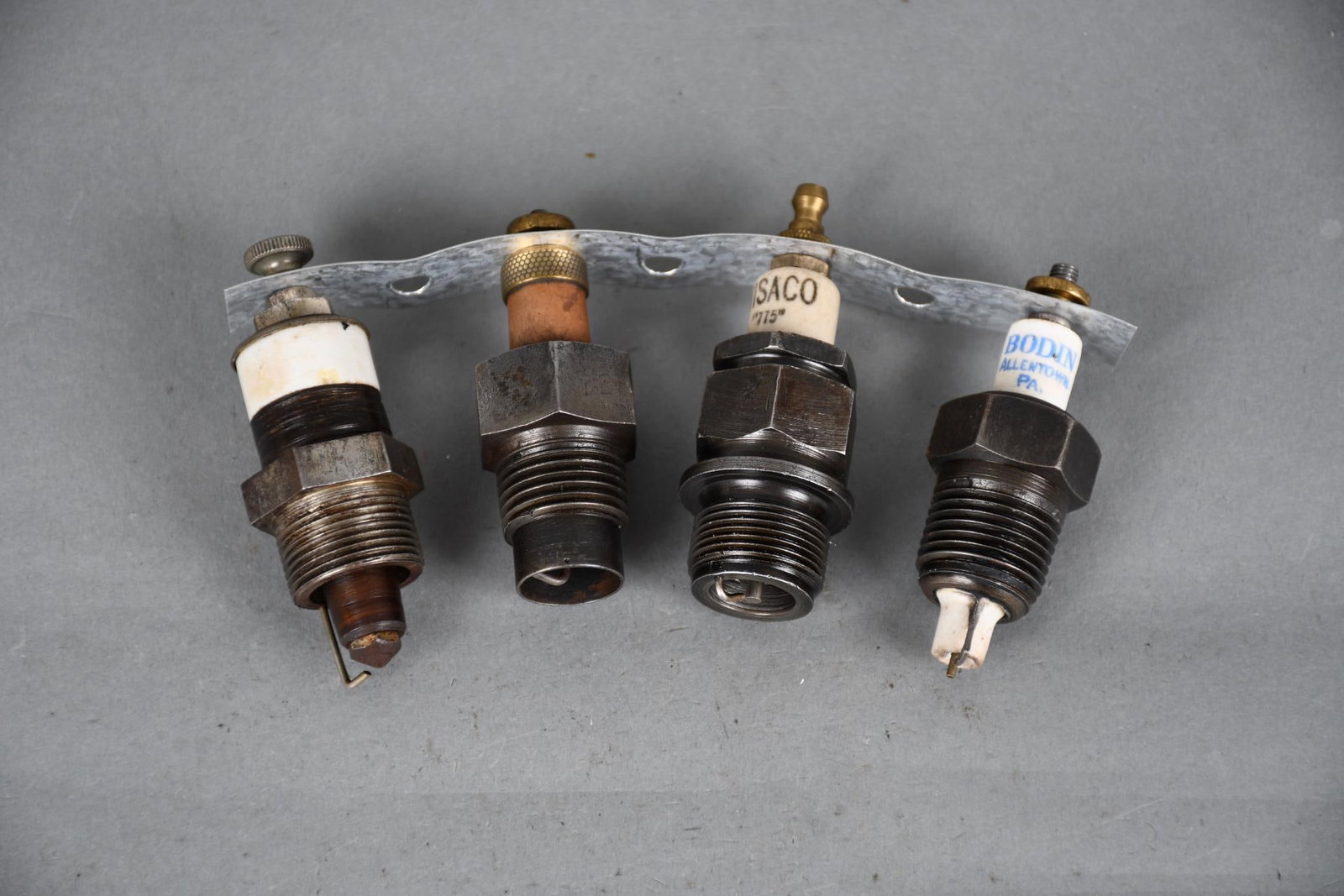 4-Spark Plugs NN chips in porcelain, NN, Wisaco, Bodin: 3"T., or less in size