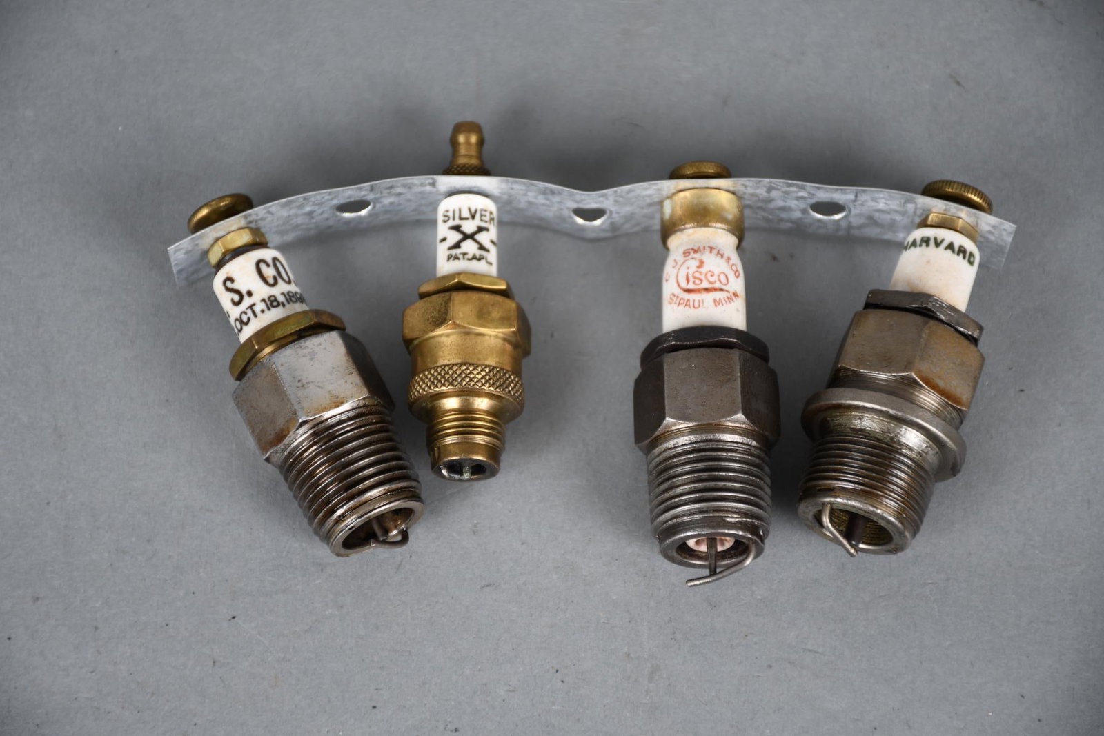 4-Spark Plugs W.S. Co., Silver X, Cisco, Harvard: 3"T., or less