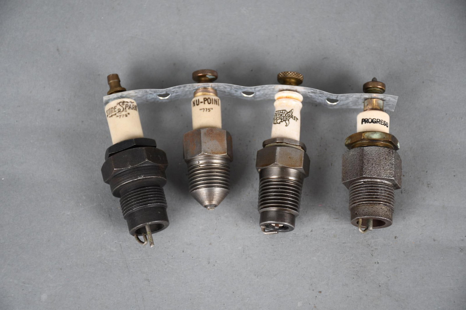 4-Spark Plugs Sure Spark, Nu-Point, Coast-to-Coast w/logo, Progress: 3.5"T., or less
