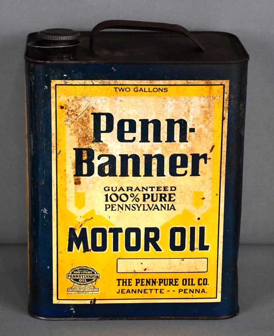 Penn-Banner Motor Oil Two-Gallon Metal Can: rated 7 & 6, the two gallon rectangle metal can is empty, display has wear and rust staining, reverse has more.