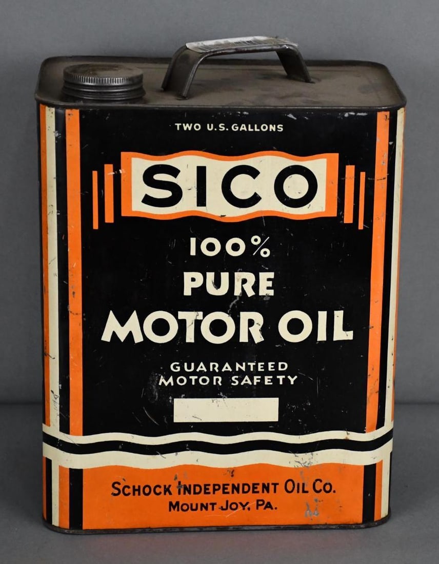 SICO Motor Oil Two-Gallon Metal Can: rated 7.5, the two-gallon rectangle metal can has wear and fine scratches, is empty.