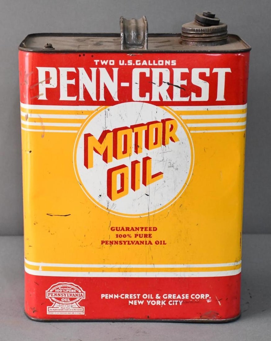 Penn-Crest Motor Two-Gallon Metal Can: rated 7.5, the two-gallon rectangle metal can, has wear and scratches, is empty.