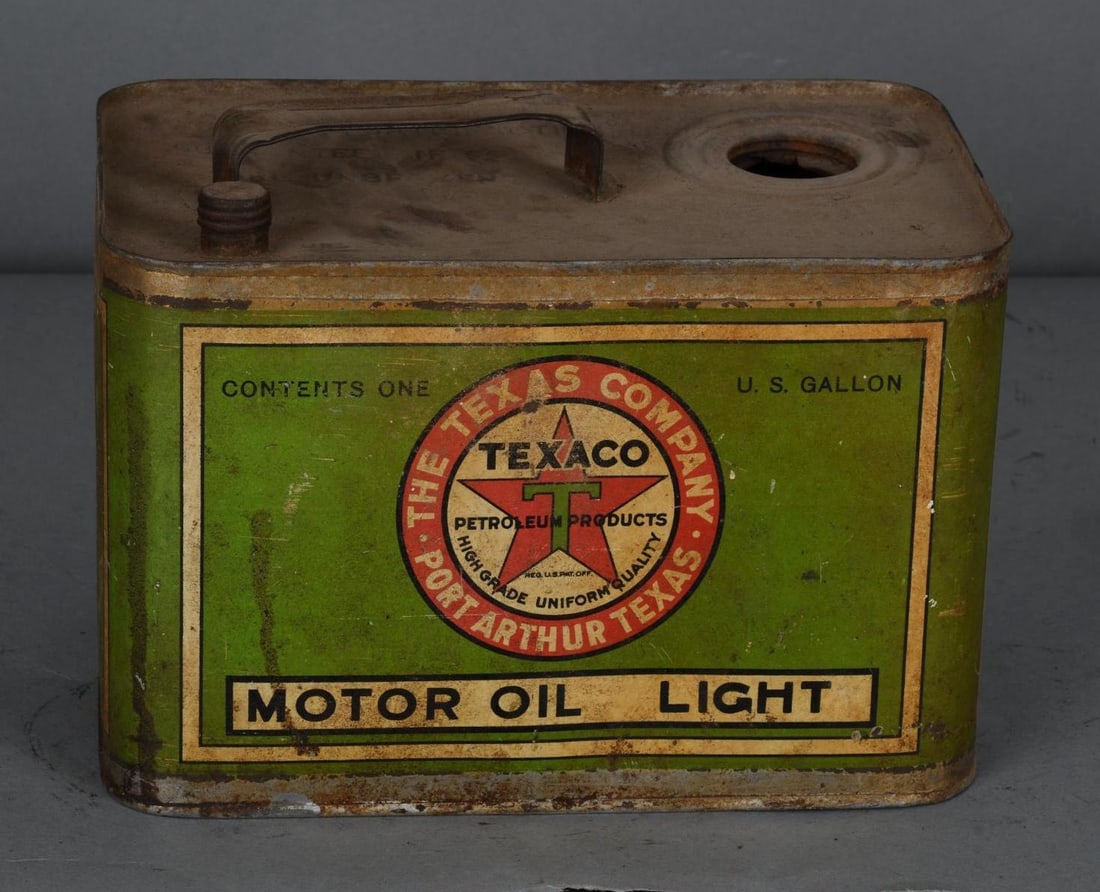 Texaco Motor Oil One Gallon Squatty Metal Can: rated 7, the one gallon squatty metal can has wear and scratches, is empty, is missing it's spout