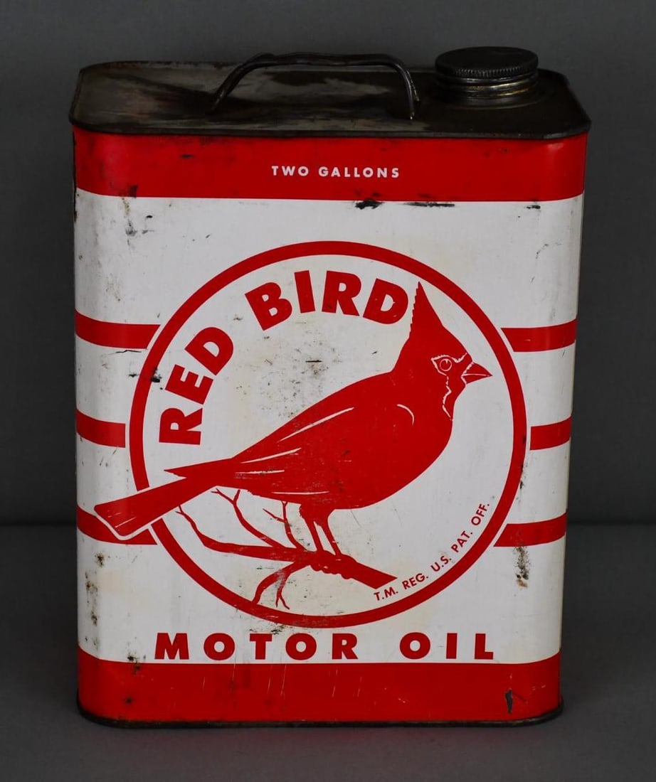 Red Bird Motor Oil w/Cardinal Image Two-Gallon Metal Can: rated 7.25, the two-gallon rectangle metal can has wear, fine scratches and scuffs, is empty.
