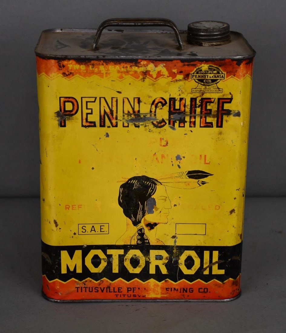 Penn Chief Motor Oil w/Indian Brave Logo Two-Gallon Metal Can: rated 6.5, the two-gallon rectangle metal can has wear, scratches and dings, is empty.