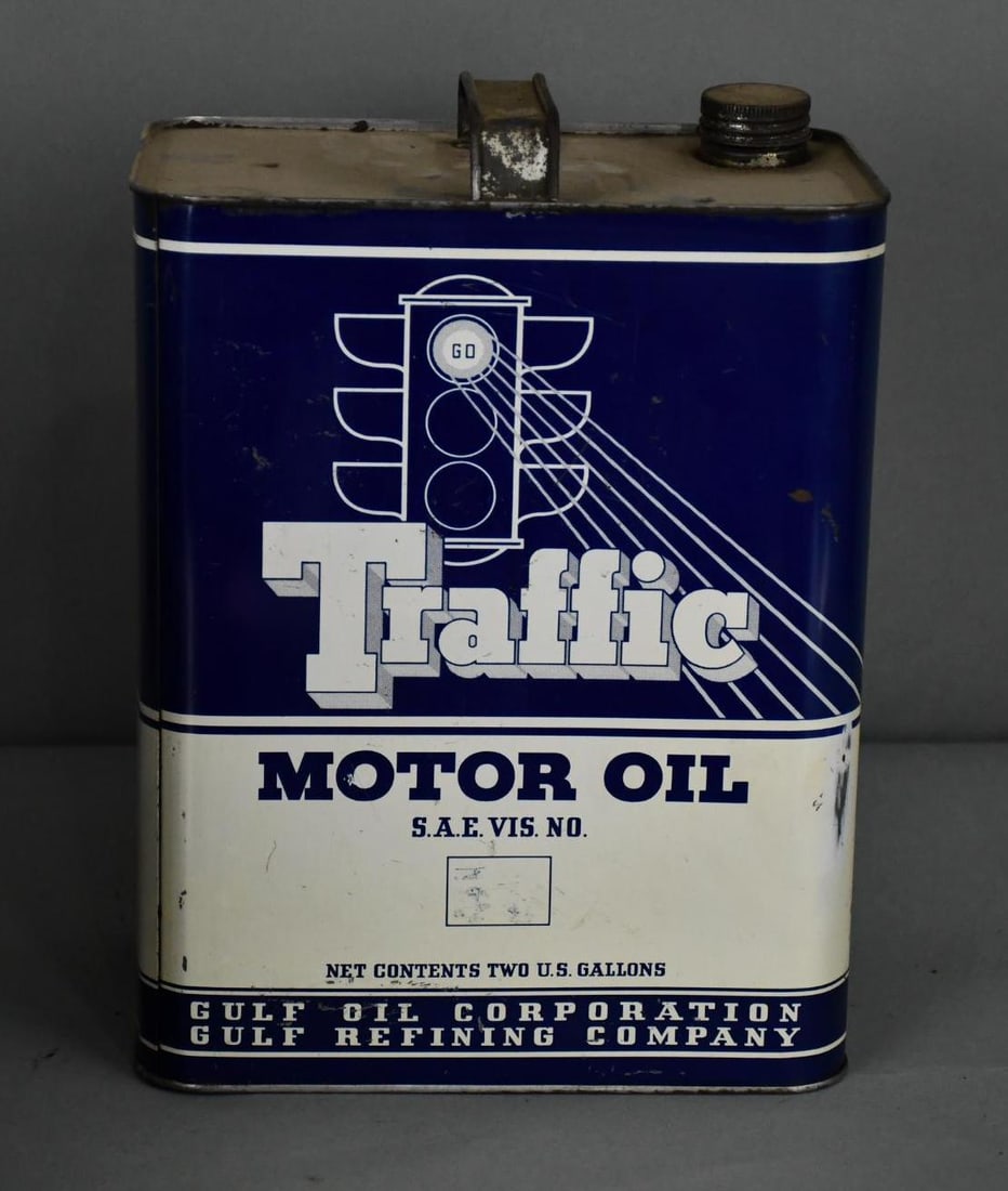 Traffic Motor Oil w/Spotlight Logo Two-Gallon Metal Can: rated 8, the two-gallon rectangle metal can has light wear and a few fine scratches, is empty.