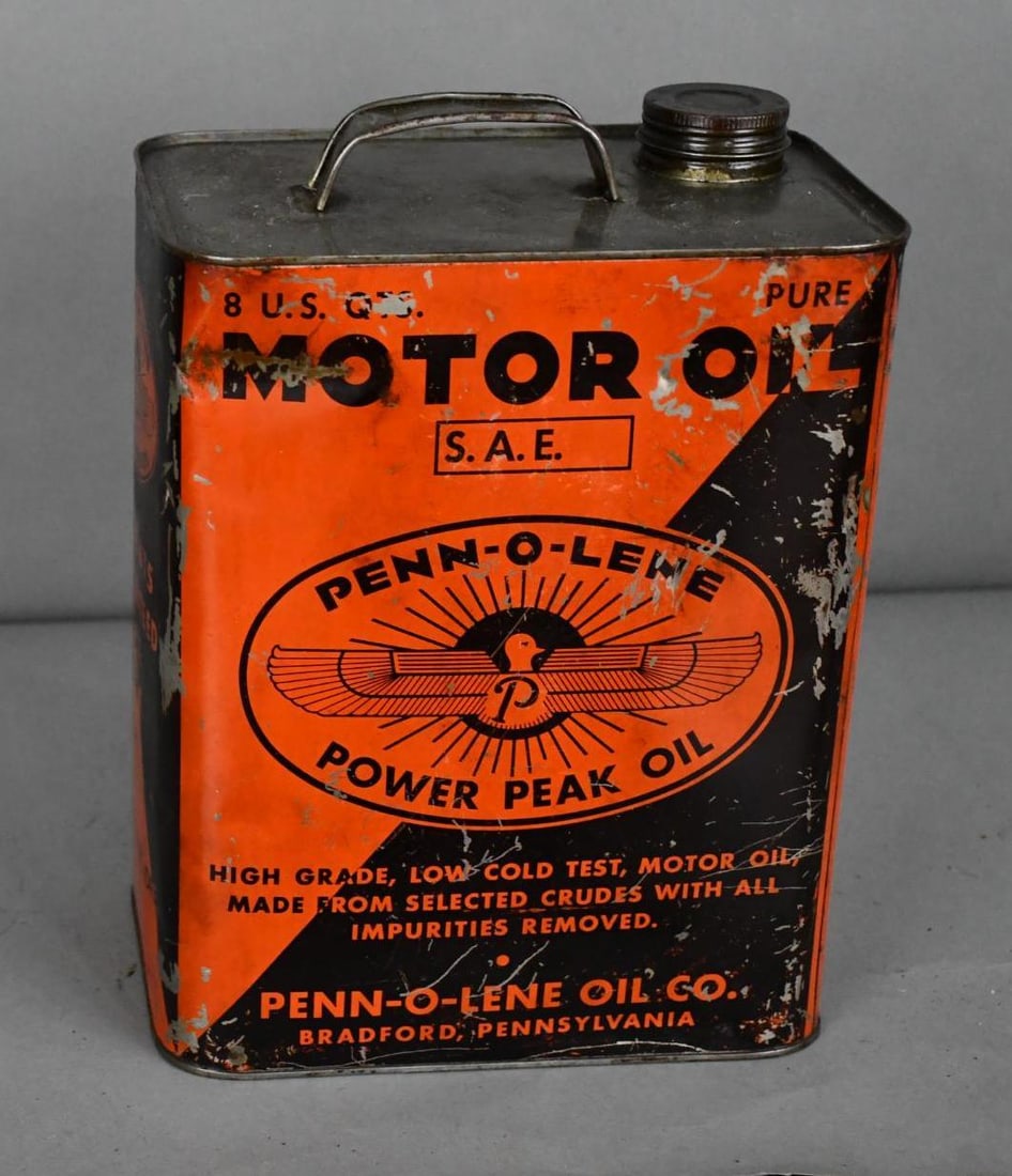 Penn-o-lene Power Peak Oil w/Logo Two-Gallon Metal Can: rated 6.75, the two-gallon rectangle metal can has wear, scratches and dings, is empty.