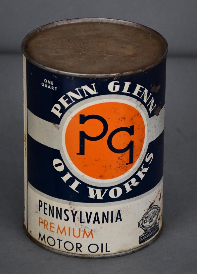 Penn Glenn Motor Oil w/Logo One Quart Round Metal Can: rated 7, the one quart round metal can has crimped seam, is full, has wear, fine scratches and scuffs.