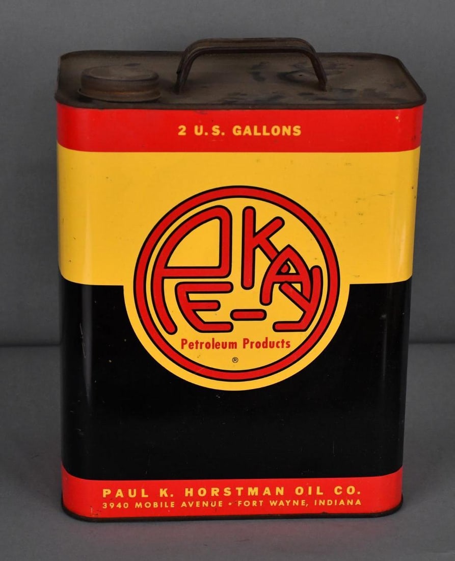 Pe-Kay Petroleum Products w/Logo Two-Gallon Metal Can: rated 9 & 8.75, the two-gallon rectangle metal can has good color and shine, display has light wear, reverse has a little more, is empty.