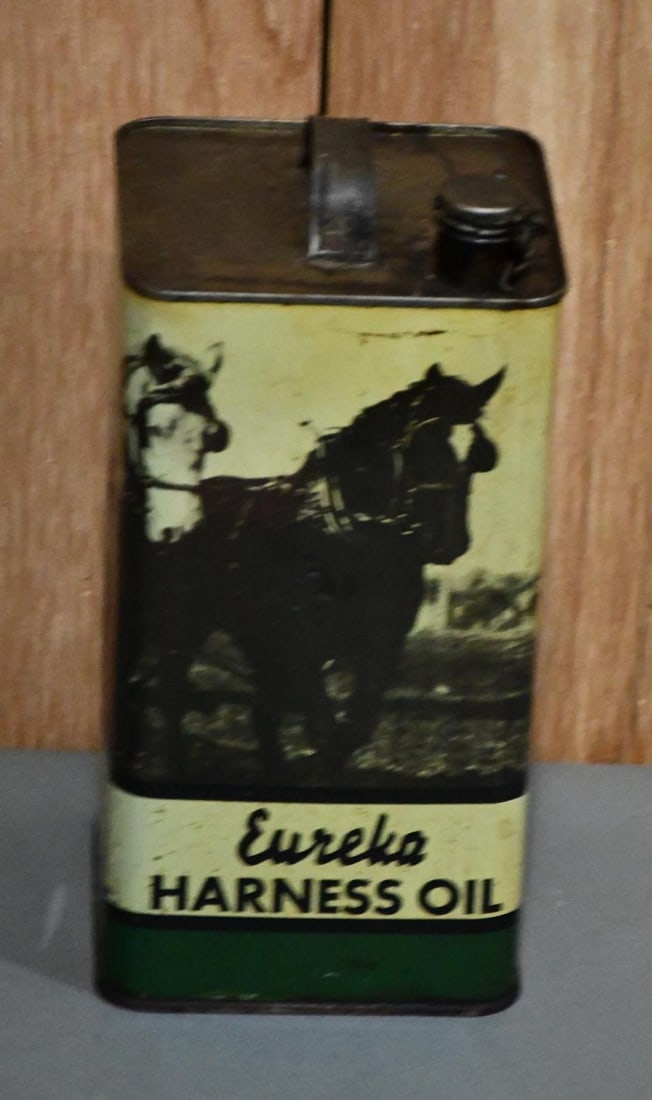 Eureka Harness Oil w/Horse Image One Gallon Metal Sign: rated 8.5, the one gallon square metal can has good color and shine, has light wear, is empty.