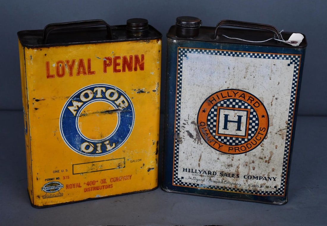 Loyal Penn Motor Oil & Hillyard's One Gallon Flat Metal Cans: rated 6.75, both one gallon flat metal cans have wear, scratches and scuffs, both are empty.