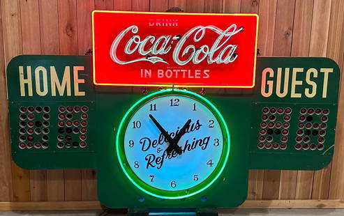 An Original Drink Coca-Cola Neon High School Metal Score Board: rated 8.5, 56"x90"x10", the metal score board has very good color and shine, has some light wear, neon works, has a plastic clock dial. A very unqiue piece.