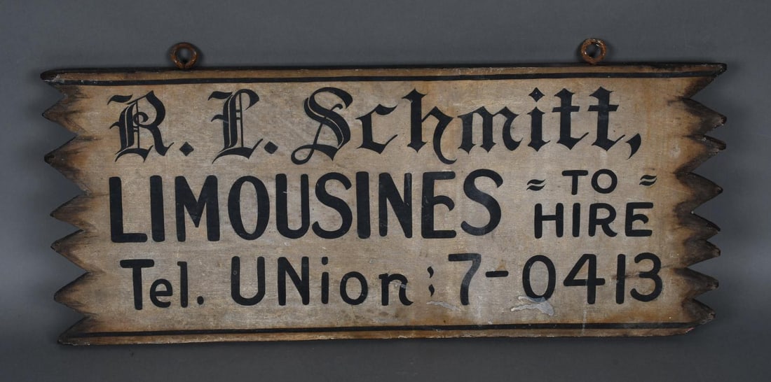 Schmitt Limousine Service Wood Sign: rated 7.5, 11.5"x27.5", the double-sided wood sign has wear and soiling.