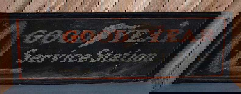 Goodyear Service Station w/Tire & Winged Foot Logo Smaltz Metal Sign (TAC): rated 7, 24"x72", the SST Smaltz painted sign has wear, scratches and damage in the lower right-hand corner, frame has damage, marked Massillon-Cleveland-Akron Sign Co. TAC #044109