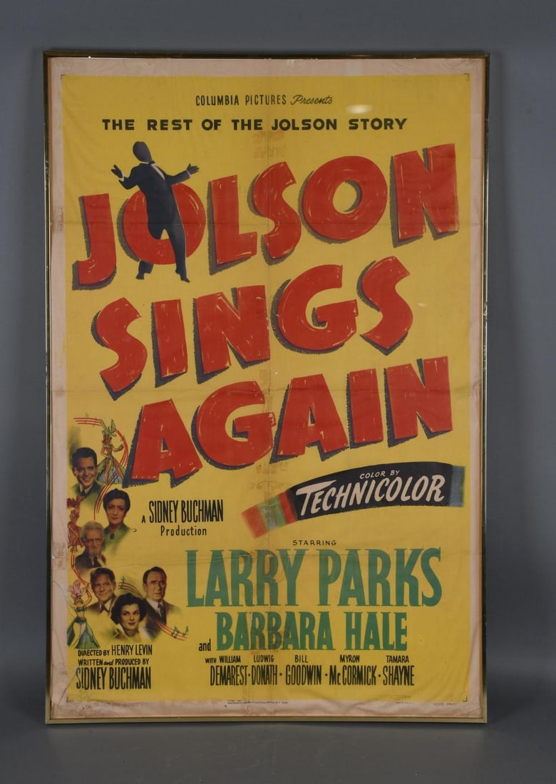 Jolson Sings Again Movie Poster Framed: rated 6.75, 41"x28", the poster has been folded, has staining and tears, is framed under glass, glass in crack in the lower left-hand corner.