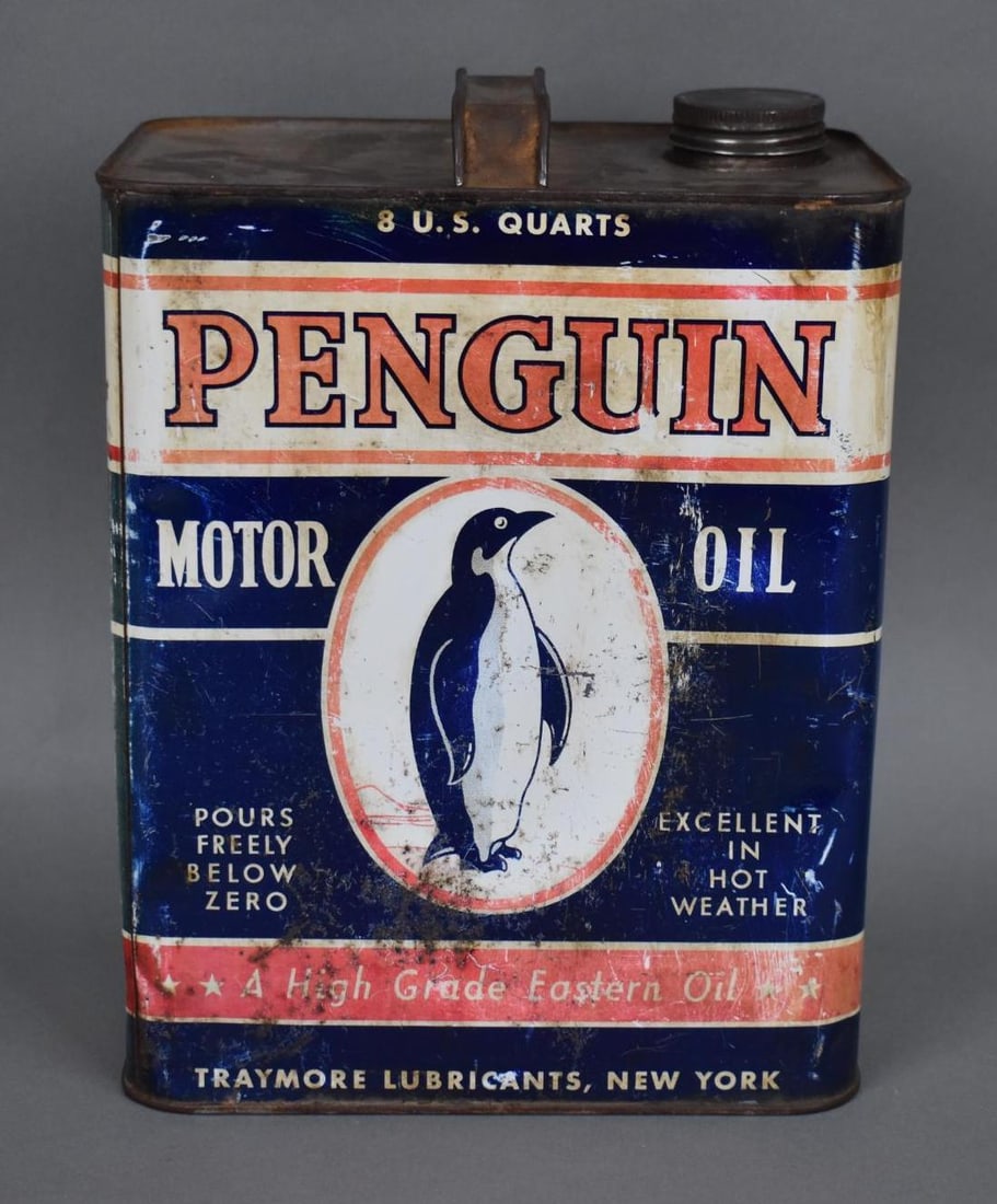Penguin Motor Oil w/Logo Two-Gallon Metal Can: rated 6.75, the two-gallon rectangle metal can, has wear, scratches and dings, is empty.