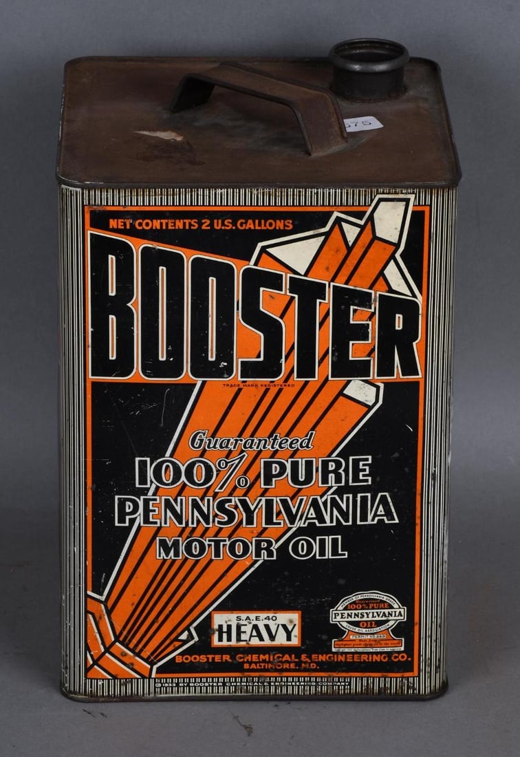 Booster Motor Oil Two Gallon Metal Can: rated 8, the two gallon square metal can has good color, has light wear and fine scratches, is empty.