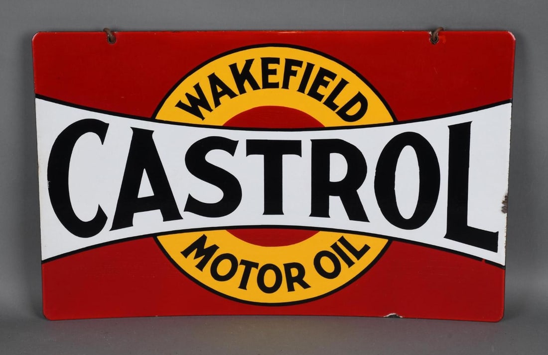 Castrol Wakefield Motor Oil Porcelain Sign: rated 9+, 13.75"x21.5", DSP sign has excellent color and gloss, fields are clean, has chips around the perimeter, has a slight bow.
