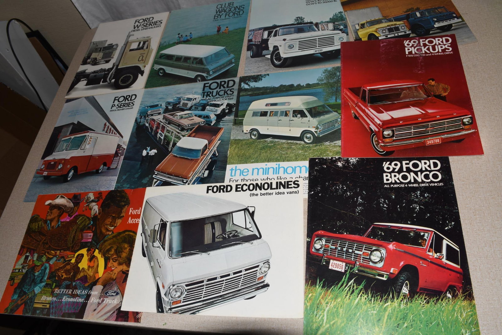 Lot of 11 Ford Brochures - 11 (1969): 11"x8.5" all have light wear.