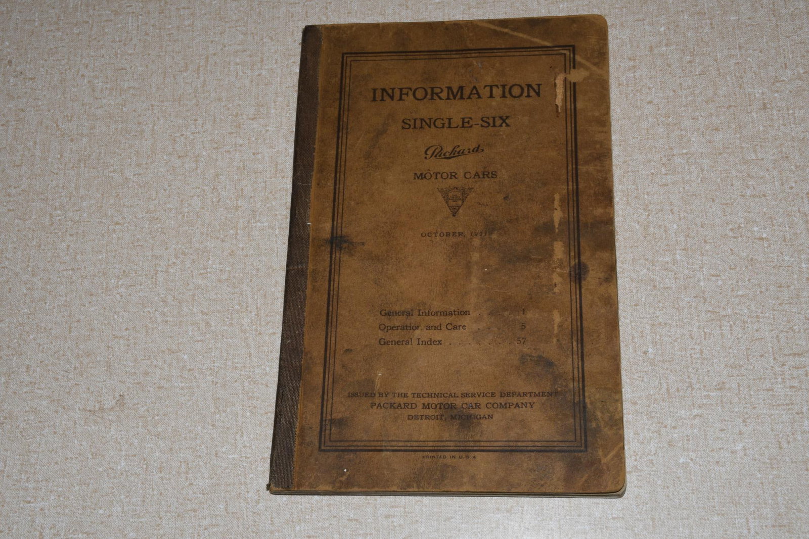 1922 Packard Single-Six Owners Information Manual: 8.5"x5.5", the glue bound manual has soiling and a few pages have damage.