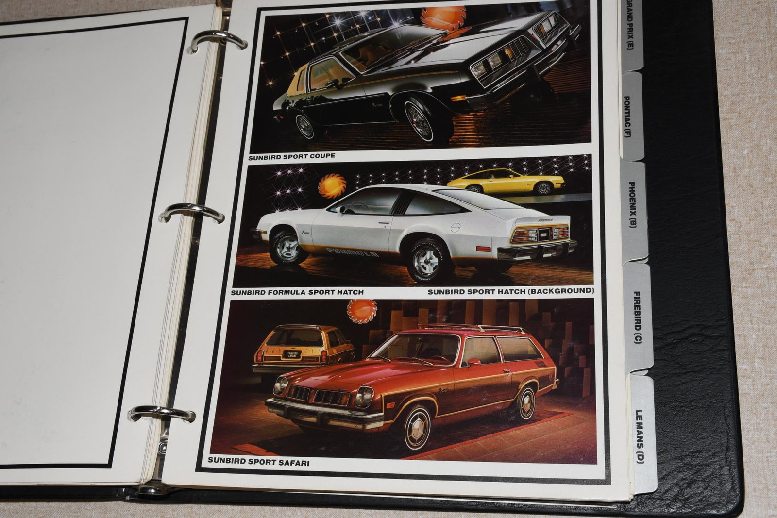 1978 Pontiac Sales Edition Dealer Album Phoenix Firebird T/A LeMans Grand Prix: 11.5"x10.5", the three ring binder is in very good condition, has color and black & white pages both.