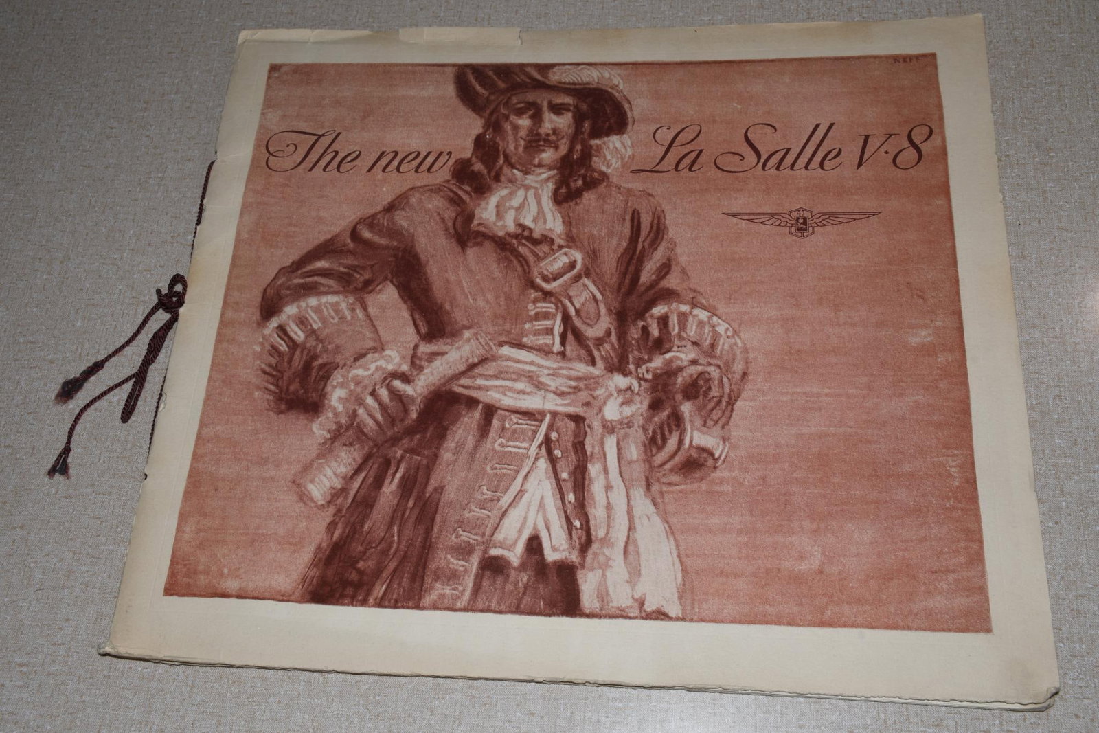 1932 Cadillac La Salle V-8 Color Prestige Dealer Sales Brochure Catalog: 13.5"x16", has a string binding, cover has edge wear and a few small tears, inside is in very good condition.