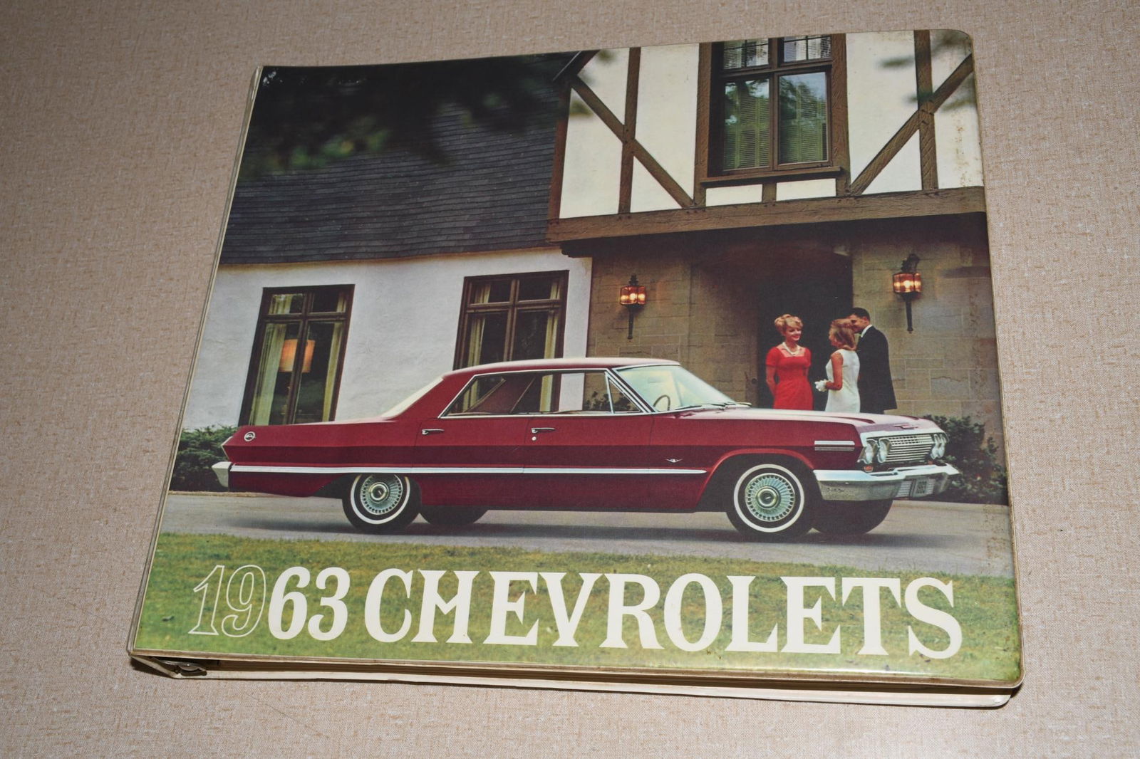 1963 Chevrolet Dealer Album Color Fabric Data Impala Corvette Chevy II Corvair: 12"x14", the eight ring binder cover is in very good condition, inside in good condition, minor wear.