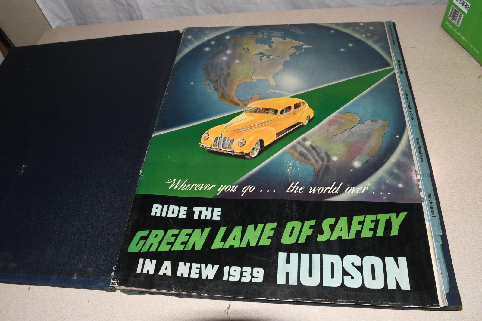 1939 Hudson Dealer Album Over-Sized: 24"X19" closed, cover has wear, all pages have good color, the first few has minor water damage at the bottom.