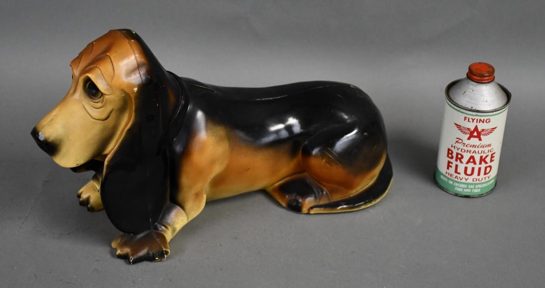 Flying A Plastic Dog Bank & Brake Fluid Can: all in good condition, both have light wear.