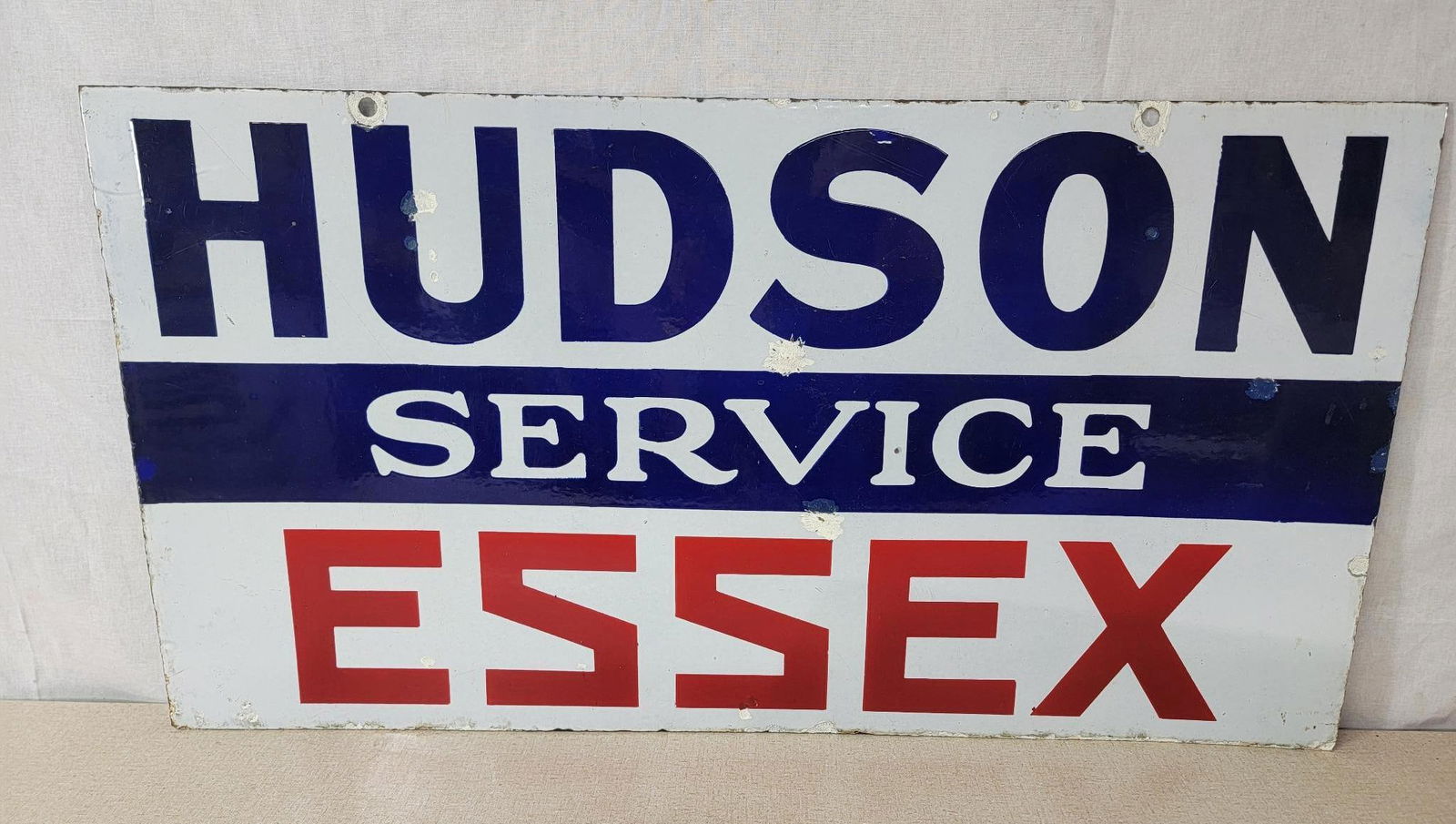 Hudson Essex Service Porcelain Sign (TAC): rated 7.5 & 7, 15.75"x29.75", the DSP sign has good color and gloss, display has several touched up chips, reverse has more chips, chips around the perimeter. TAC #044122