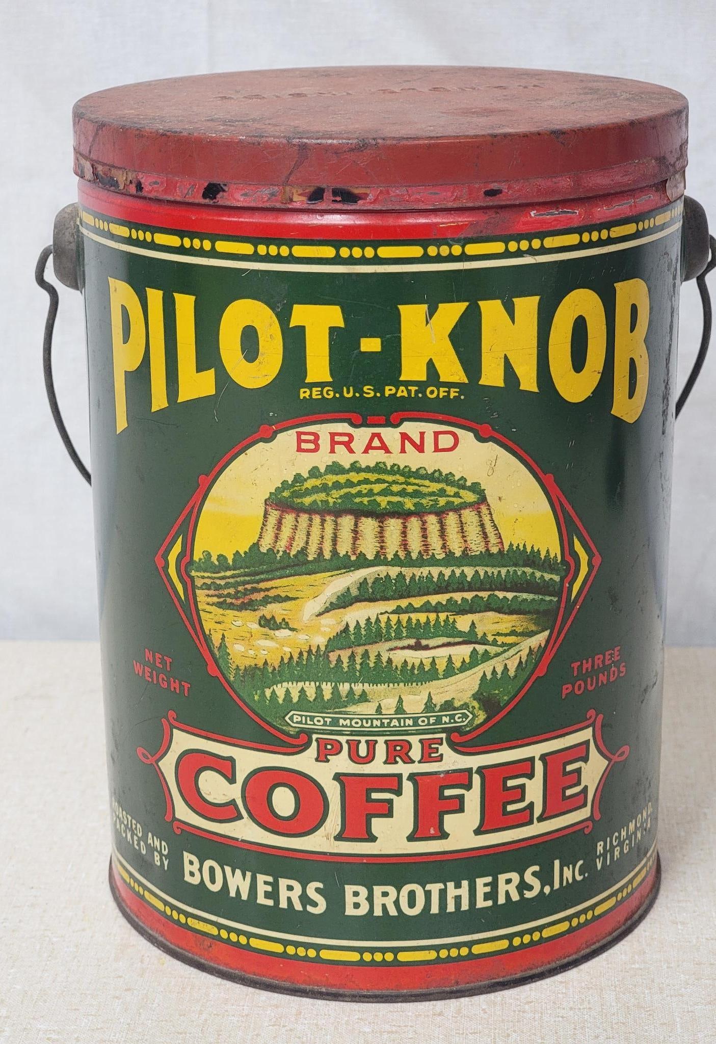 Pilot-Knob Pure Coffee Three Pound Metal Can w/Bail Handle (TAC): rated 8.9, 8.25"T., the three pound round metal can has good color and shine, has light wear, lid has more wear and soiling. TAC #044967