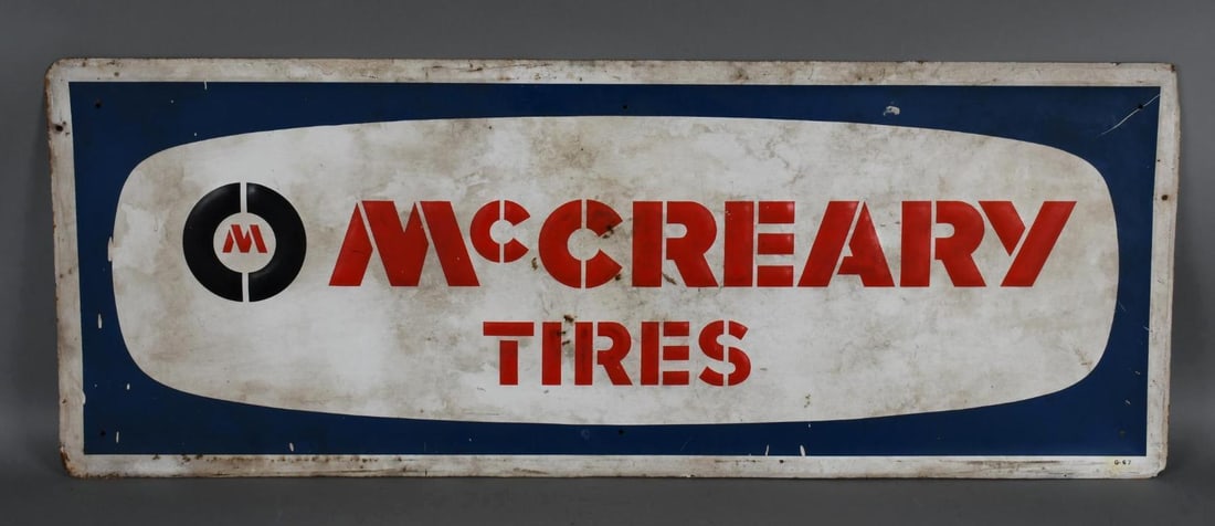 McCreary Tires Metal SIgn: rated 6.5, 18"x47.5", the SST embossed sign has scratches and soiling.
